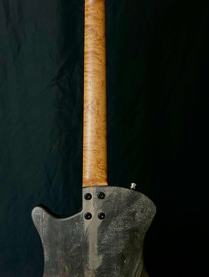 He Used A 3D Mold To Turn Stacks Of Newspapers Into A Guitar That Actually Rocks He Used A 3D Mold To Turn Stacks Of Newspapers Into A Guitar That Actually Rocks