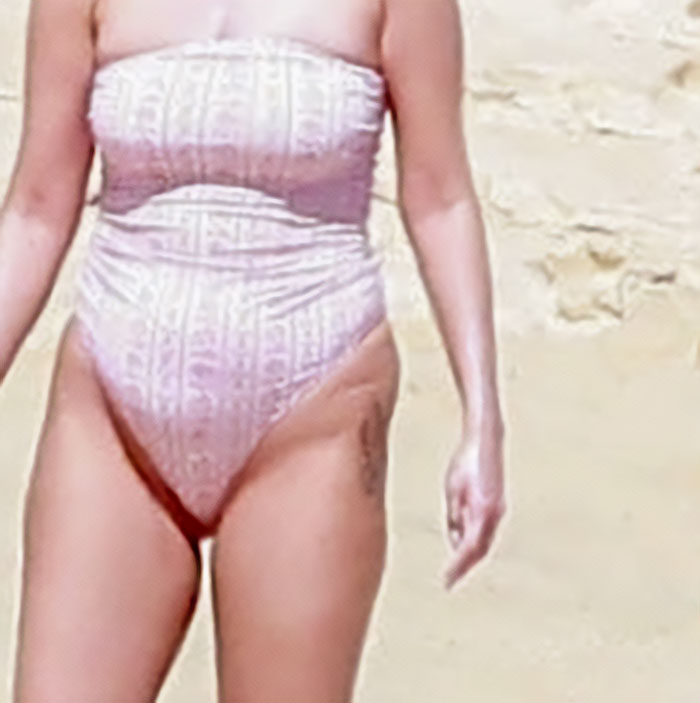 Selena Gomez’s Latest Swimsuit Snaps Spark Heated Debate After Fans Notice Odd Detail