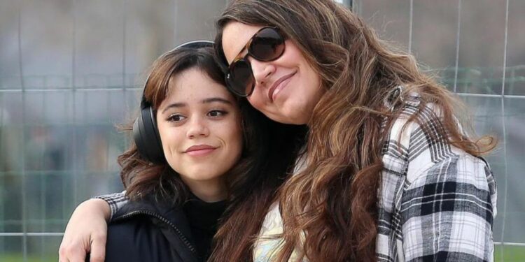 Jenna and her Mom posing for a photo