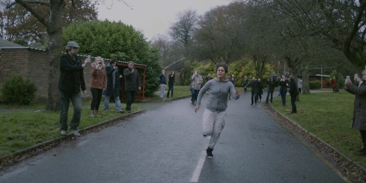 A crowd chasing a girl named victoria