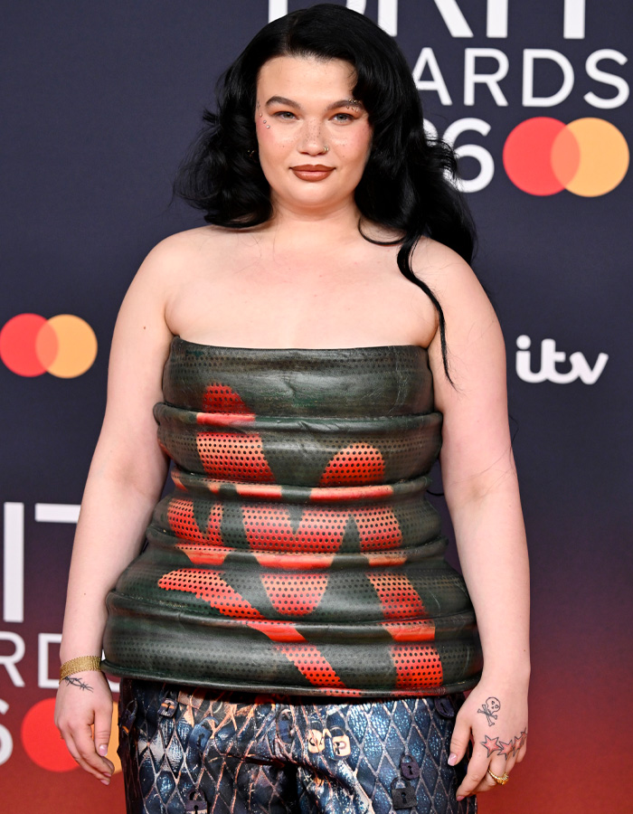“Oil Container”: Fans Hilariously Roast Lola Young’s Outfit On The Brit Awards 2026 Red Carpet