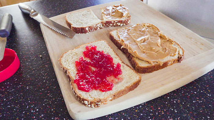 Lady Won’t Stop Eating Peanut Butter Because Roomie’s Unannounced Guest Is Allergic, Drama Ensues