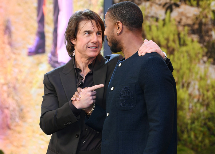“Seems Terrifying”: Fans Spot Bizarre Detail In Photo Of Tom Cruise Hugging Michael B. Jordan