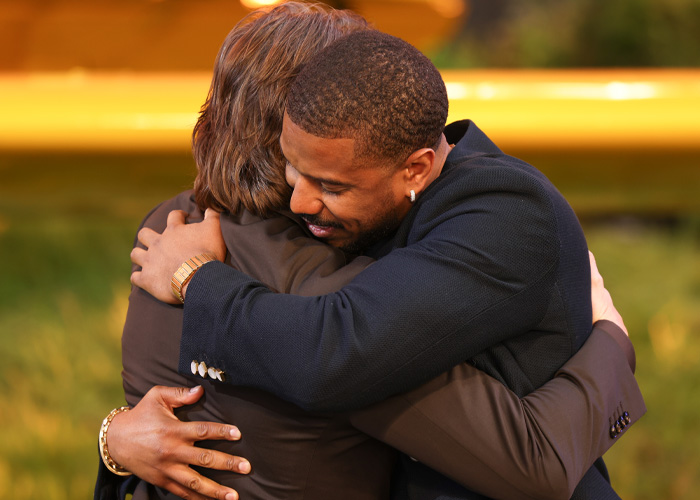 “Seems Terrifying”: Fans Spot Bizarre Detail In Photo Of Tom Cruise Hugging Michael B. Jordan
