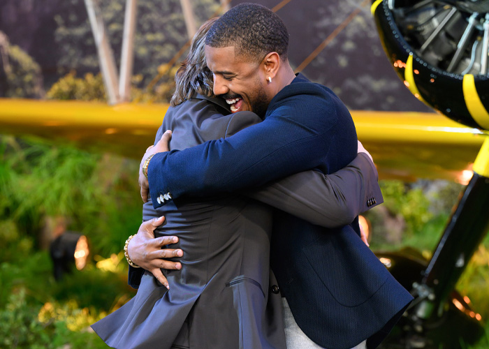 “Seems Terrifying”: Fans Spot Bizarre Detail In Photo Of Tom Cruise Hugging Michael B. Jordan