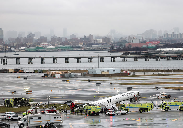 Air Canada Flight Attendant Found In Horrifying Place After LaGuardia Crash