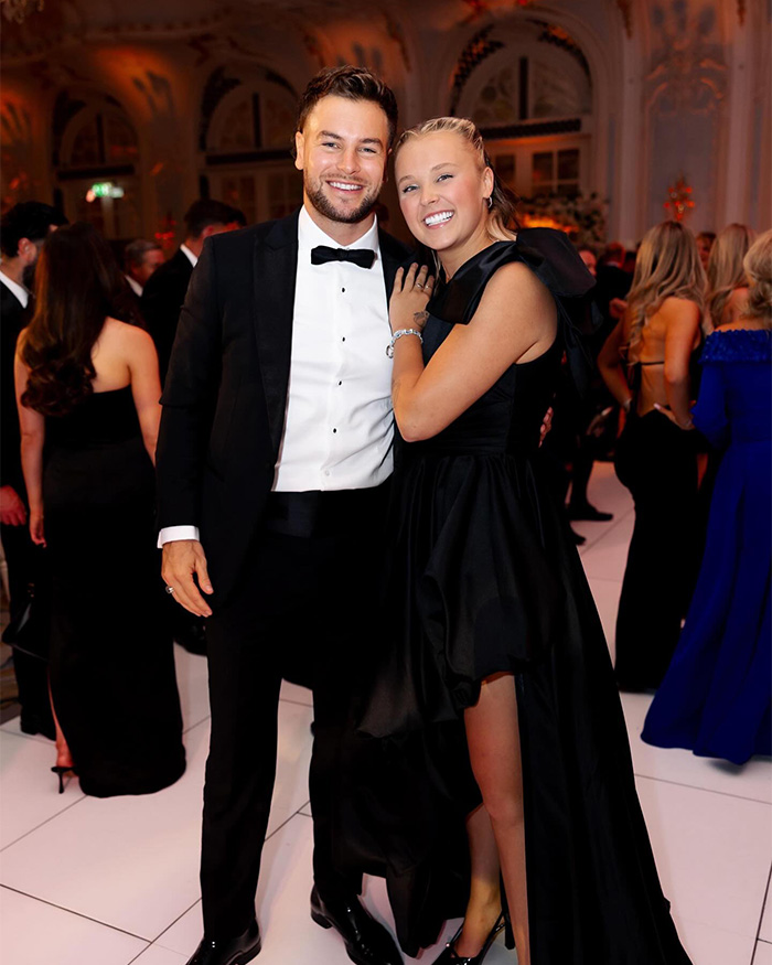 JoJo Siwa’s Look For ‘Hannah Montana’ Special Sparks Debate After Her “Trad Wife” Transformation