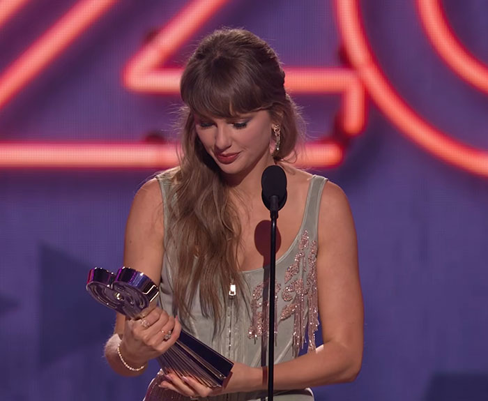 Taylor Swift And Travis Kelce’s “Awkward” Appearance At iHeartMusic Awards Sparks Wild Fan Theories