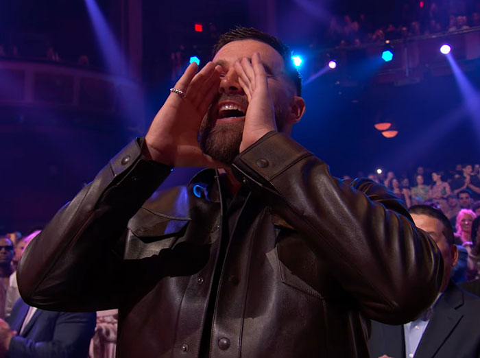 Taylor Swift And Travis Kelce’s “Awkward” Appearance At iHeartMusic Awards Sparks Wild Fan Theories