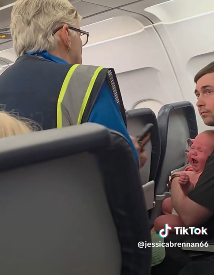“I Hope You Sue”: Couple Sparks Debate After Airline Kicks Them Off Flight Due To Their “Sick” Crying Baby
