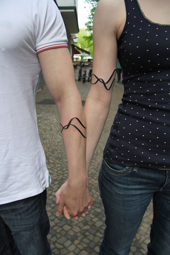 Not Typical Matching Ink: 15 Couple Tattoos That Interact Across Bodies Made By This Artist