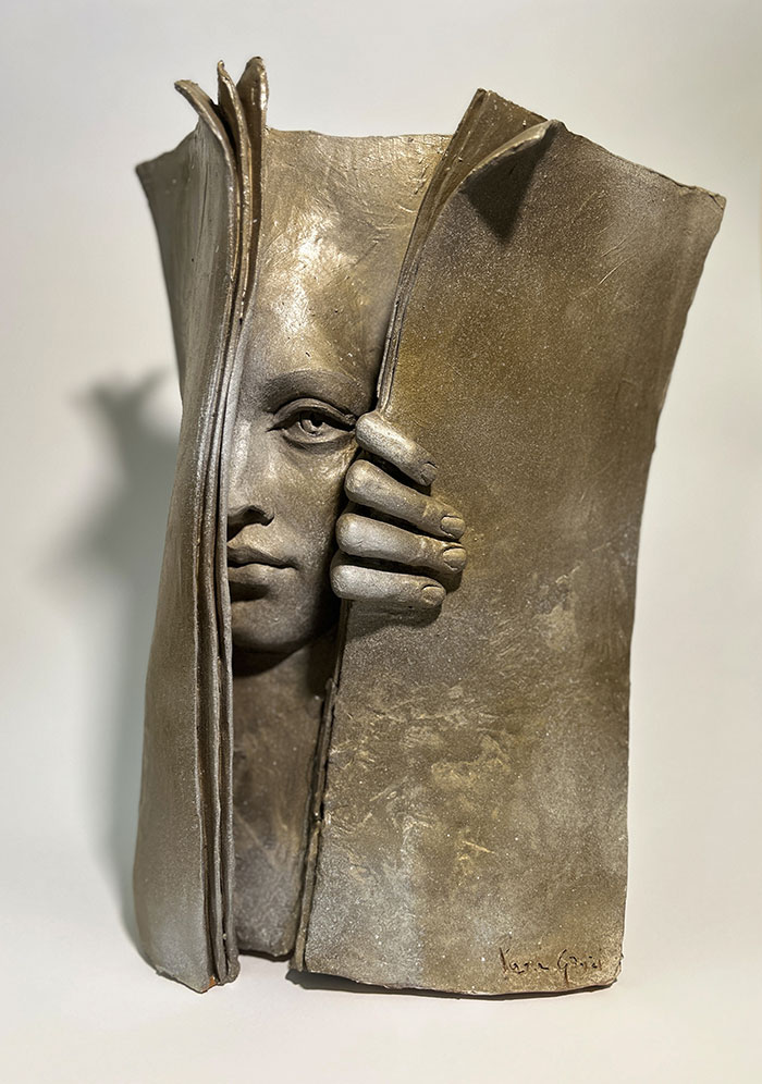 Artist Paola Grizi Turns Bronze And Clay Into Stunning Sculptures Of Hidden Faces (25 Pics)