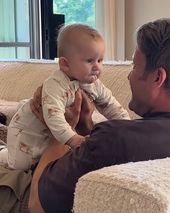 Gay Dad Breaks Silence After Fierce Backlash Over Video “Mocking” Surrogate Baby Crying For “Mama”