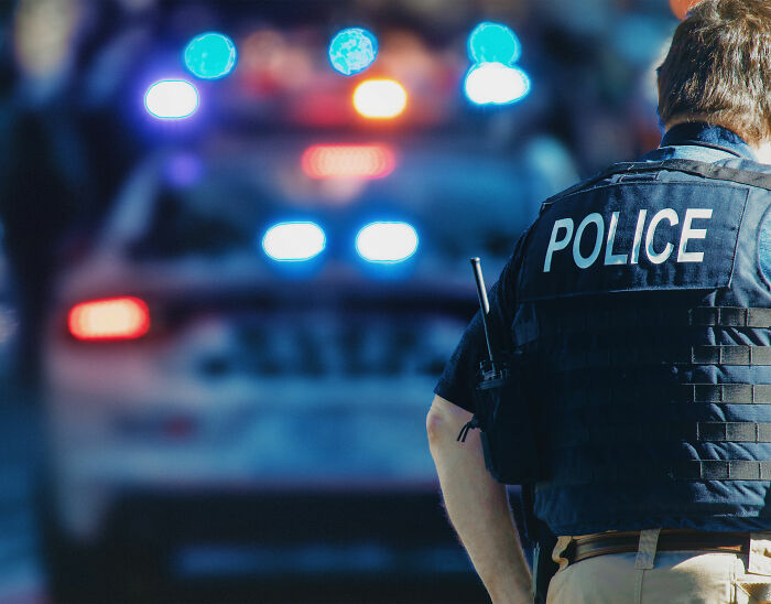 “Karen” Faces Instant Karma After Making Racist Comments To Kids Then Biting Cop