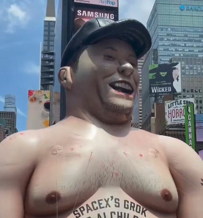 Giant Inflatable Of Elon Musk Mysteriously Appears In Times Square With Scathing Message Giant Inflatable Of Elon Musk Mysteriously Appears In Times Square With Scathing Message
