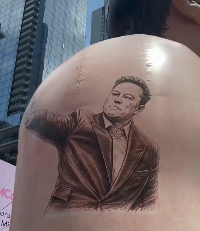 Giant Inflatable Of Elon Musk Mysteriously Appears In Times Square With Scathing Message Giant Inflatable Of Elon Musk Mysteriously Appears In Times Square With Scathing Message