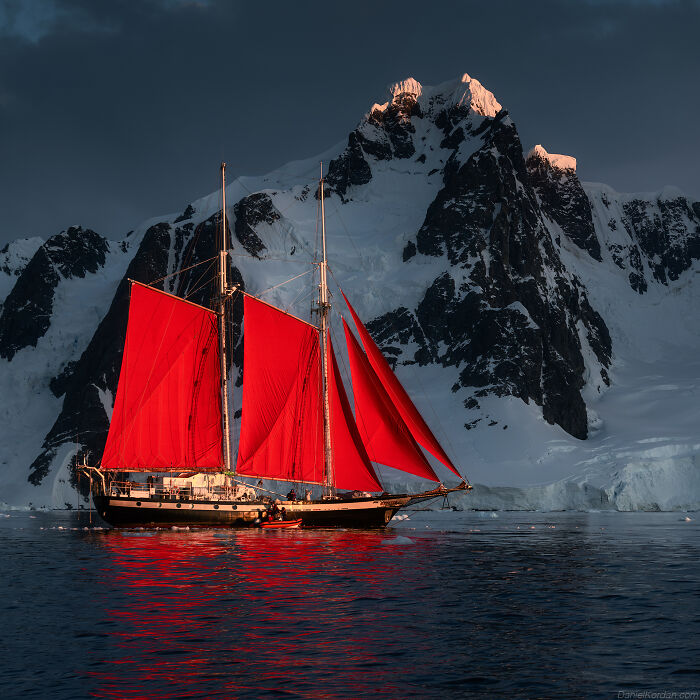 This Photographer Captured Antarctica’s Frozen Landscapes From A Red-Sailed Schooner (42 Pics) This Photographer Captured Antarctica’s Frozen Landscapes From A Red-Sailed Schooner (42 Pics)