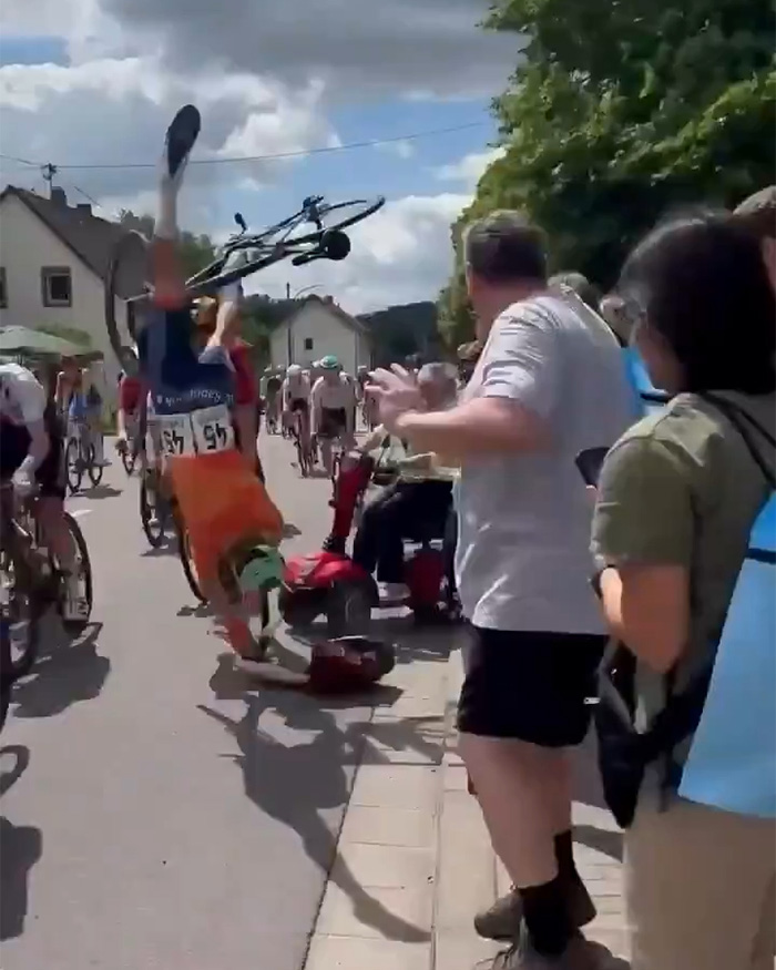 Bike Race Descends Into Chaos After Elderly Woman Charges Into Course On Mobility Scooter, Prompts Mass Crash