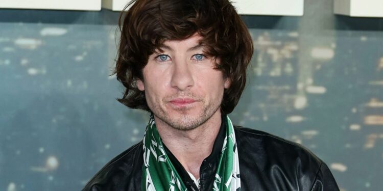 Barry Keoghan wearing a black leather jacket with a green and white patterned scarf at the January 2026 screening of Crime 101 Barry Keoghan wearing a black leather jacket with a green and white patterned scarf at the January 2026 screening of Crime 101