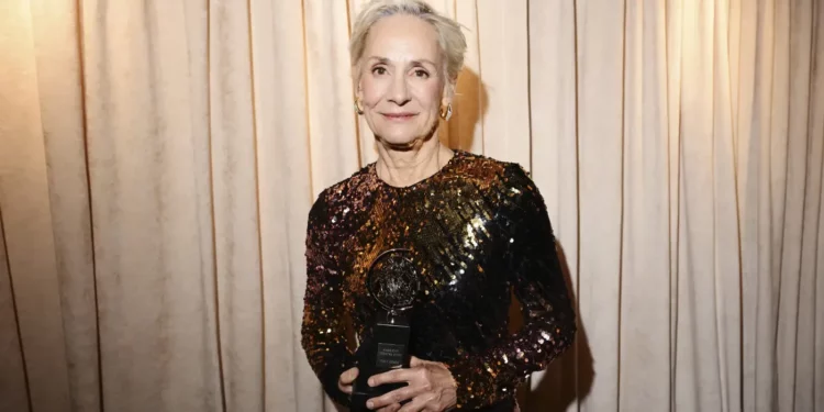 Laurie Metcalf holding the tony award Laurie Metcalf holding the tony award