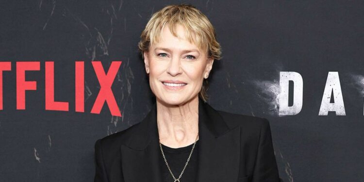 actress Robin Wright is attending a photo call for the Netflix film Damsel.