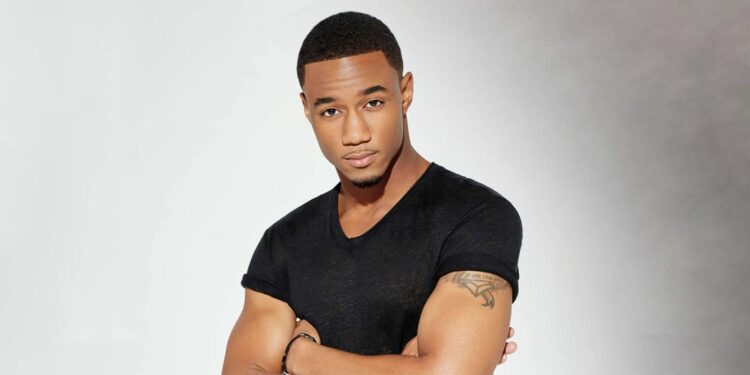 Jessie T. Usher wearing a black shirt Jessie T. Usher wearing a black shirt