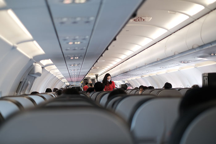 Woman Physically Stops Stranger From Reclining On An Overnight Flight, Throws A Tantrum Woman Physically Stops Stranger From Reclining On An Overnight Flight, Throws A Tantrum