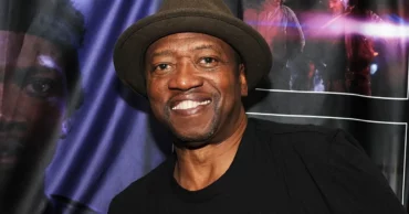 T.K. Carter smiling for a photo