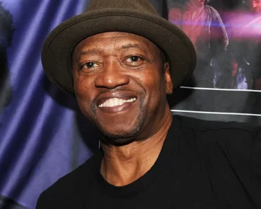 T.K. Carter smiling for a photo