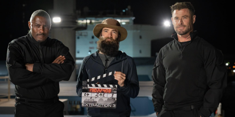 Idris Elba, Sam Hargrave, and Chris Hemsworth on the Set of Extraction 3