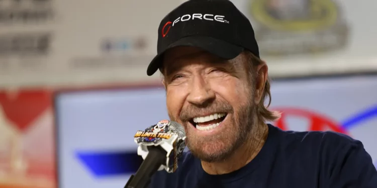 Chuck Norris in a news conference before a NASCAR event. Chuck Norris in a news conference before a NASCAR event.