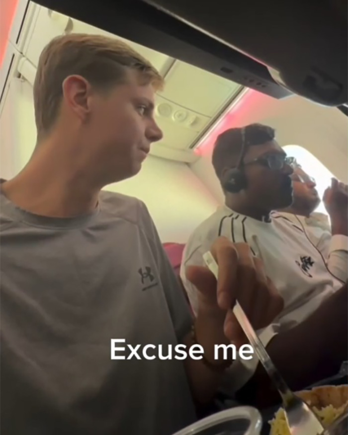 Passenger Confronts Total Stranger For Chewing With His Mouth Open On Plane, Sparks Viral Debate Passenger Confronts Total Stranger For Chewing With His Mouth Open On Plane, Sparks Viral Debate