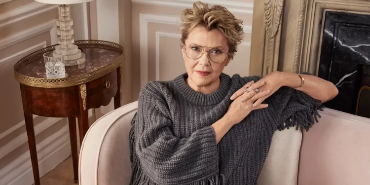 Annette Bening sitting on a sofa Annette Bening sitting on a sofa