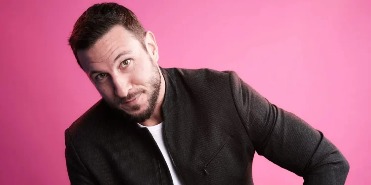 Pablo Schreiber with pink background Pablo Schreiber with pink background