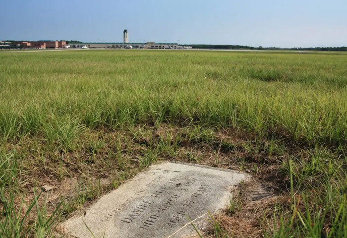 This Airport Was Built Around Two Graves, And The Couple Buried There Has Quite A Story This Airport Was Built Around Two Graves, And The Couple Buried There Has Quite A Story