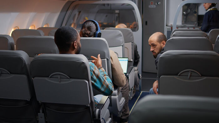 Woman Gets Kicked Under Her Seat By Entitled Man, He Claims The Space Under Her Seat Is His Woman Gets Kicked Under Her Seat By Entitled Man, He Claims The Space Under Her Seat Is His
