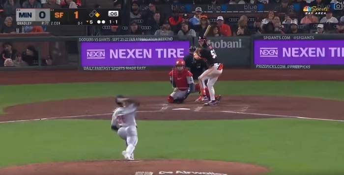 Giants Camera Catches Mom Doing Double Duty With A Baby And Food, Her Husband Just Gets Comfy Giants Camera Catches Mom Doing Double Duty With A Baby And Food, Her Husband Just Gets Comfy