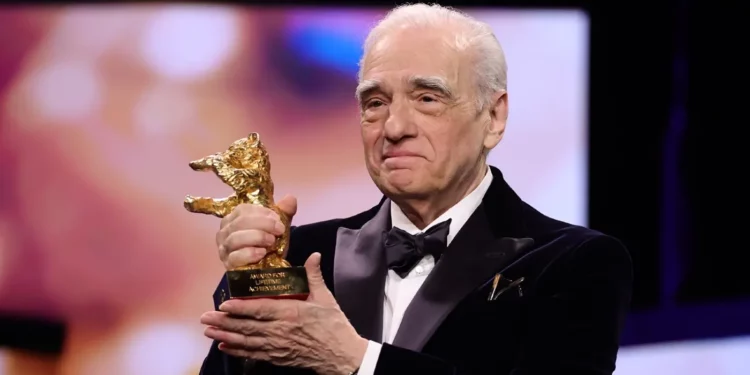 Martin Scorsese holding the Honorary Golden Bear award. Martin Scorsese holding the Honorary Golden Bear award.