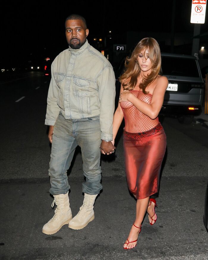 Kanye West And Bianca Censori Hit With Fierce Backlash Over Her Latest Fishnet Look: “Humiliating His Wife” Kanye West And Bianca Censori Hit With Fierce Backlash Over Her Latest Fishnet Look: “Humiliating His Wife”