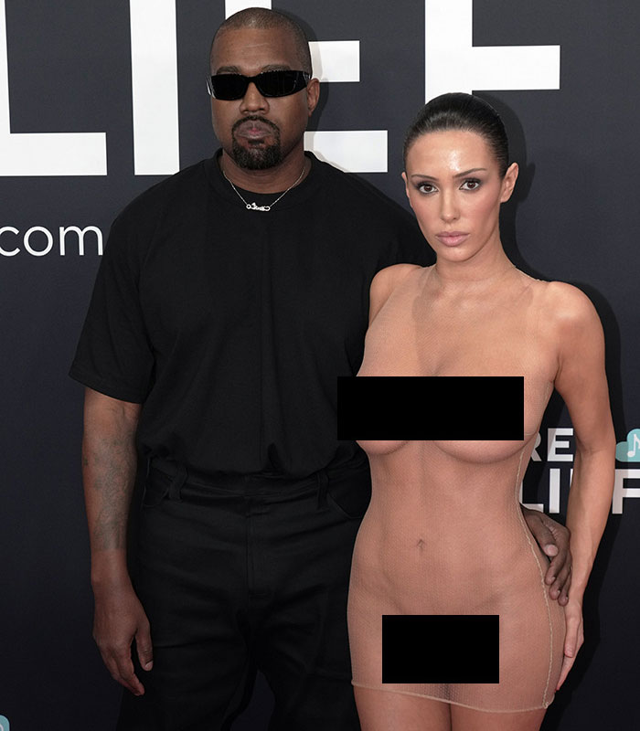 Kanye West And Bianca Censori Hit With Fierce Backlash Over Her Latest Fishnet Look: “Humiliating His Wife” Kanye West And Bianca Censori Hit With Fierce Backlash Over Her Latest Fishnet Look: “Humiliating His Wife”
